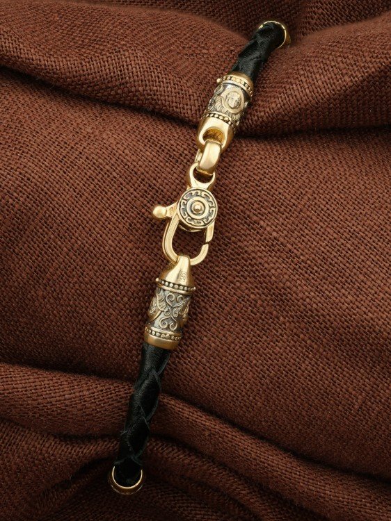 Браслет из лимонного золота c кожаным шнурком и ониксом