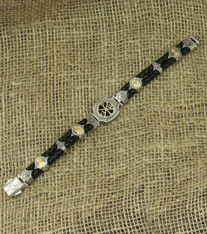 Браслет из серебра и золота c кожаным шнурком и ониксом