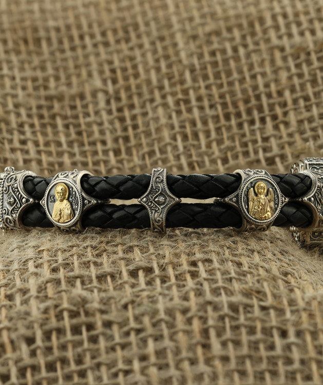 Браслет из серебра и золота c кожаным шнурком и ониксом